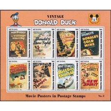 GUY3190MF-MINIFOLHA POSTERS DAS PRODUÇÕES DISNEY Nº 2, 8 VALORES - GUIANA - 1994 - MÍNIMA FERRUGEM NA BORDA, SELOS MINT